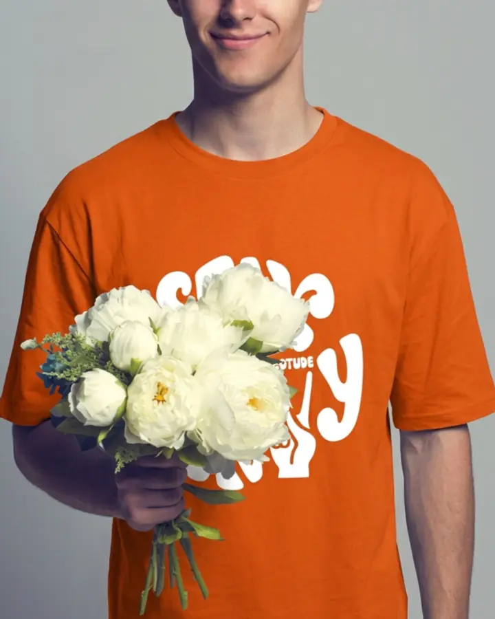FitMagik's AI result: the same man wearing an orange printed T-shirt